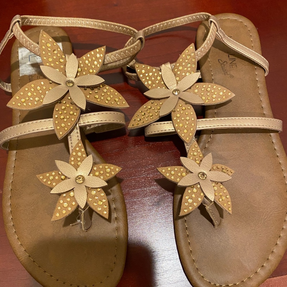 Rhinestone flower sandals.